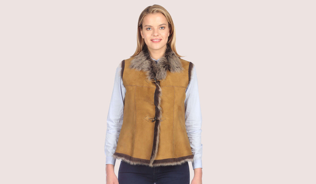 A luxurious women's shearling vest paired with winter essentials, showcasing timeless style, warmth, and versatility for chic cold-weather outfits.