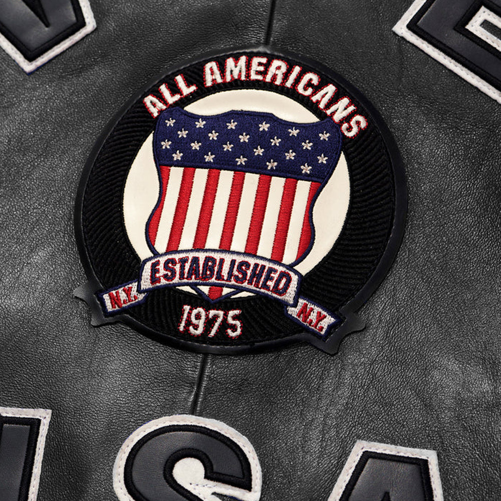 Patch with 'All Americans' and American flag design on a leather surface