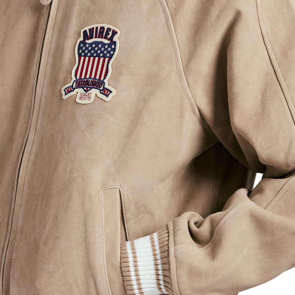 Beige jacket with Avirex logo featuring an American flag design.