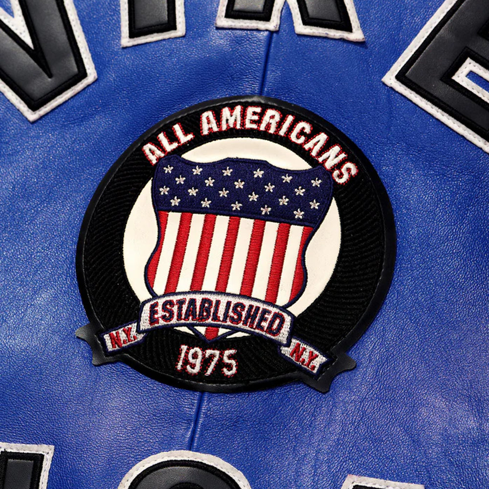 Patch on a blue background with 'All Americans' and 'Established 1975' text