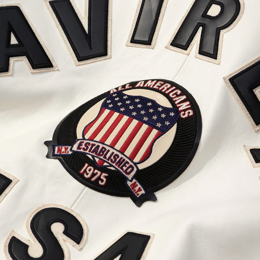 Close-up of a patch with an American flag design and text on a white background