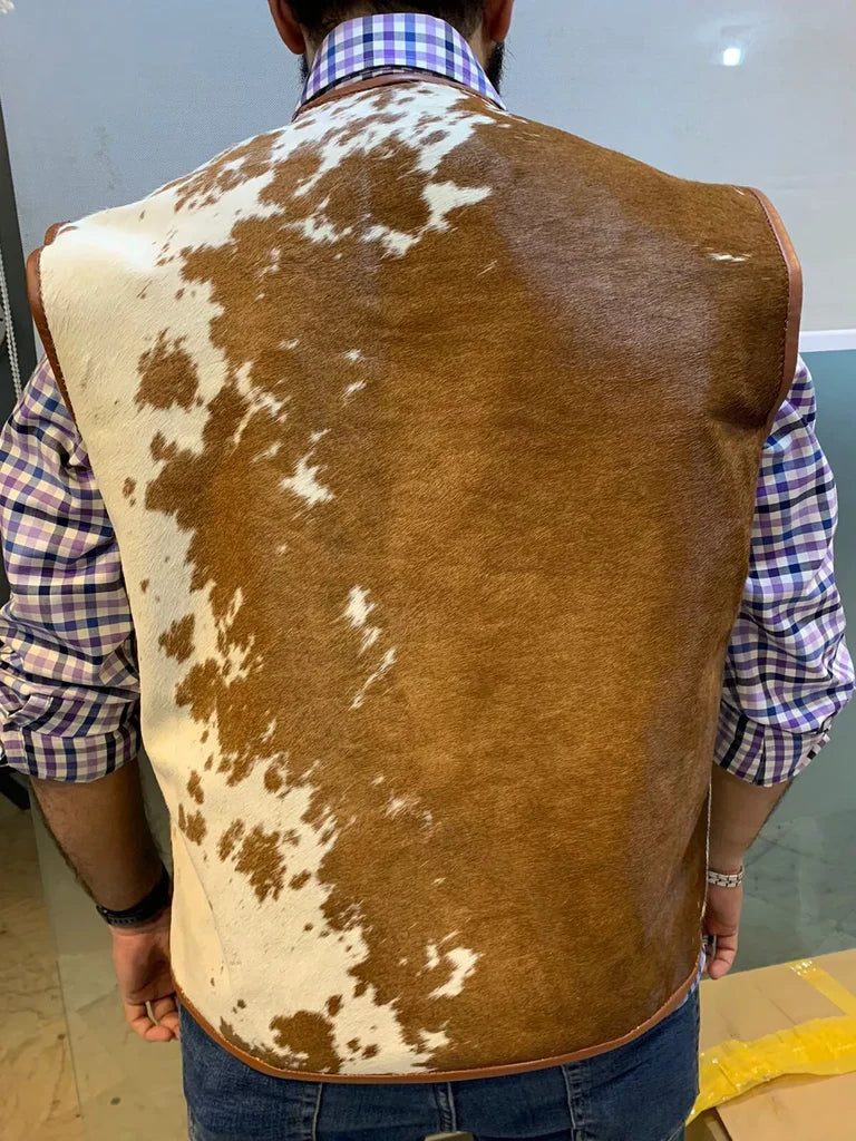 Back of the men's cowhide leather vest showcasing the natural brown and white fur pattern, handcrafted for a rugged Western look.