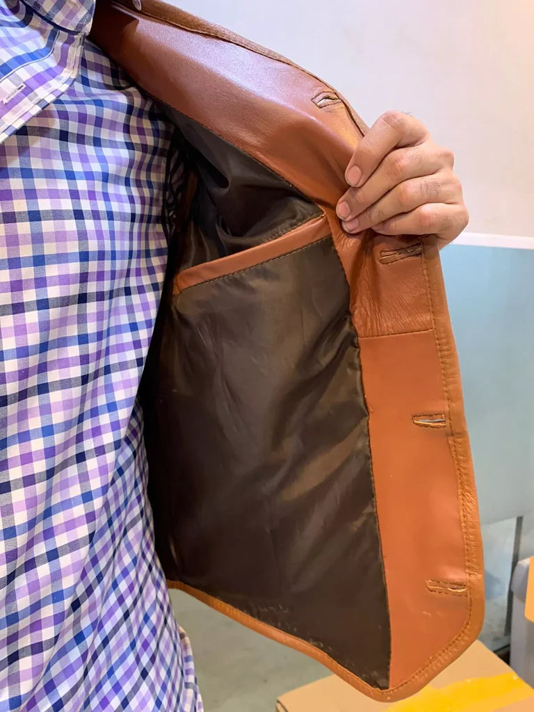 Soft and smooth satin lining inside the cowhide leather vest, ensuring comfort and premium craftsmanship.