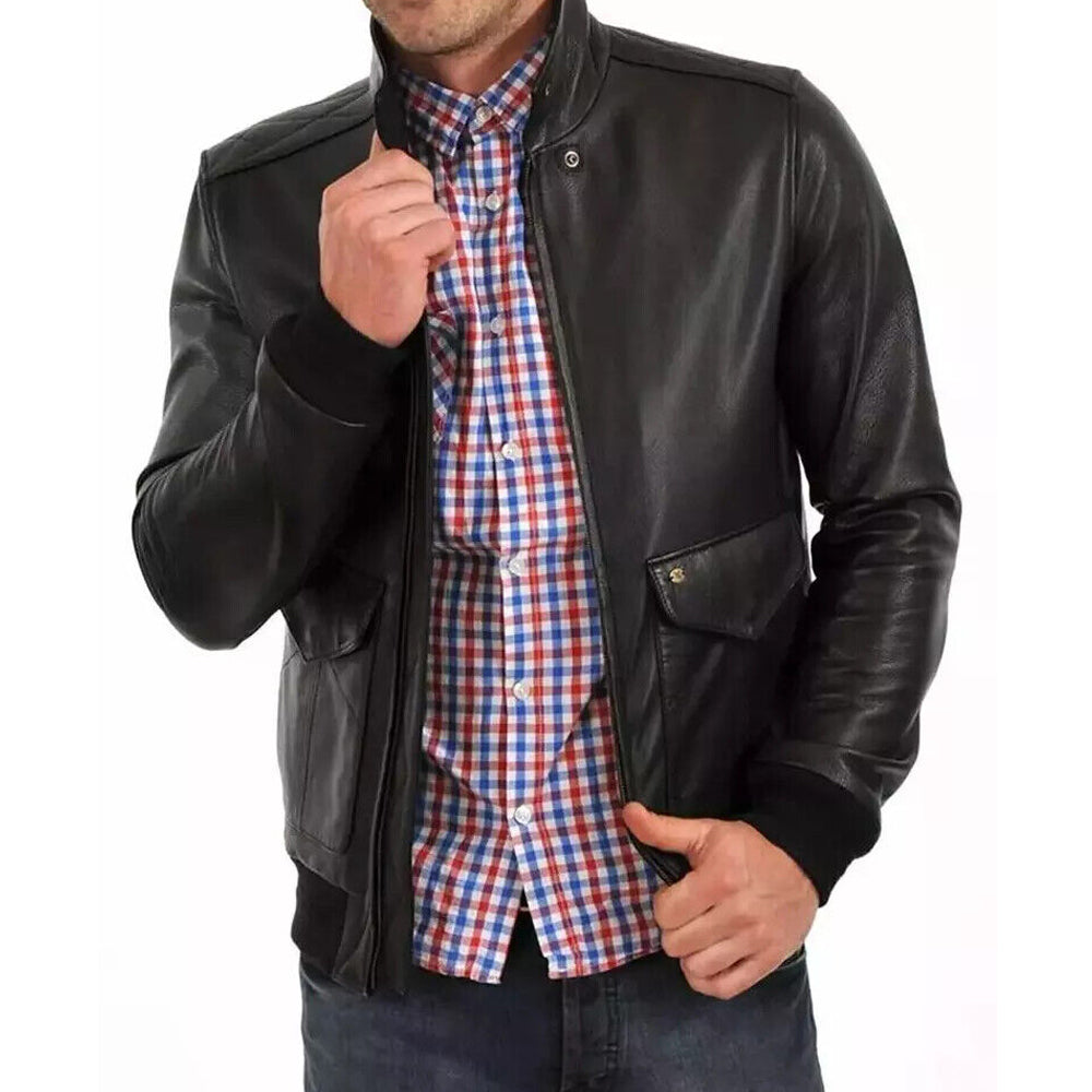 Man wearing a brown lambskin leather bomber jacket with open zip, showcasing the vintage design and comfortable fit.