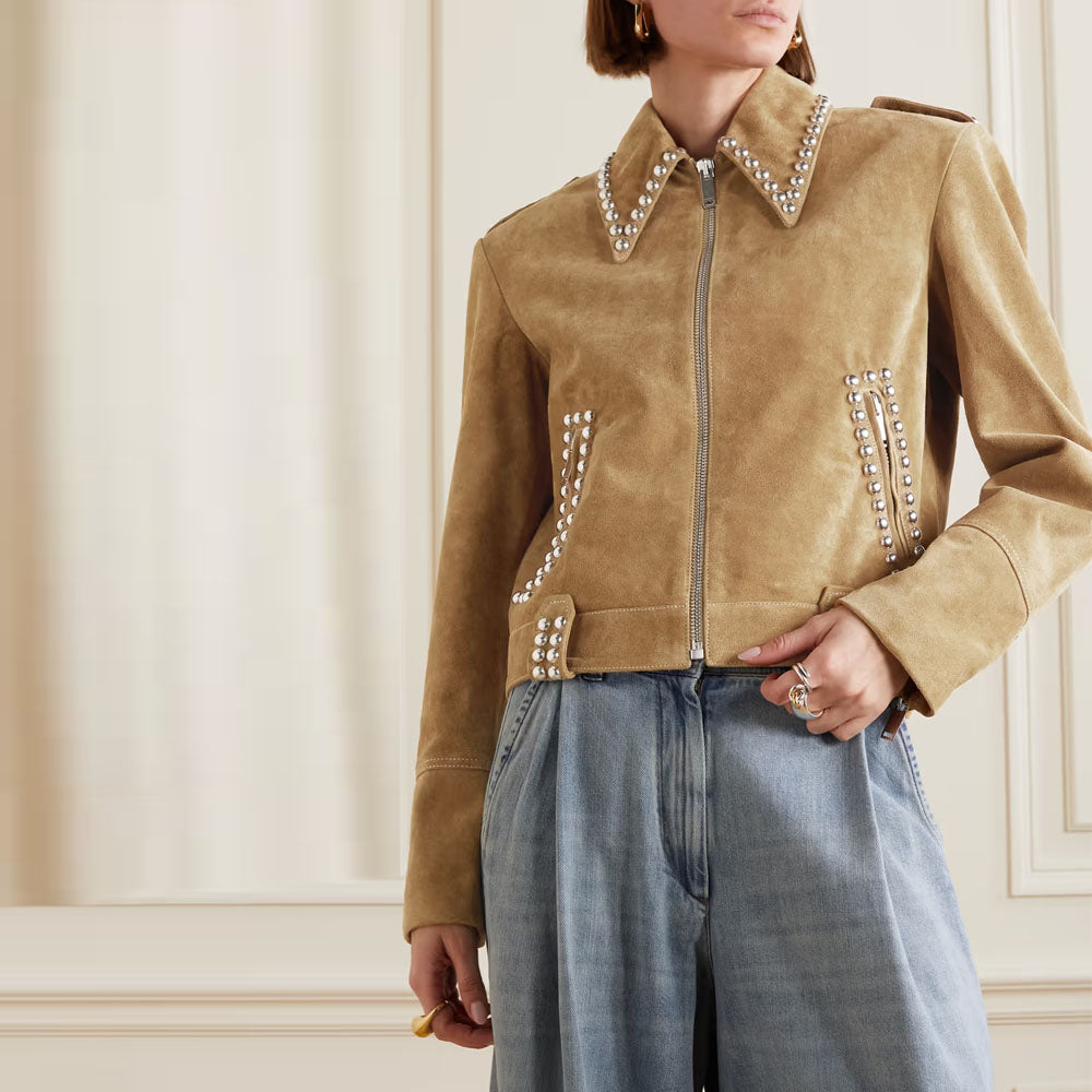 Model wearing the brown suede leather jacket, paired with black pants, showcasing a chic and versatile look for casual outings.