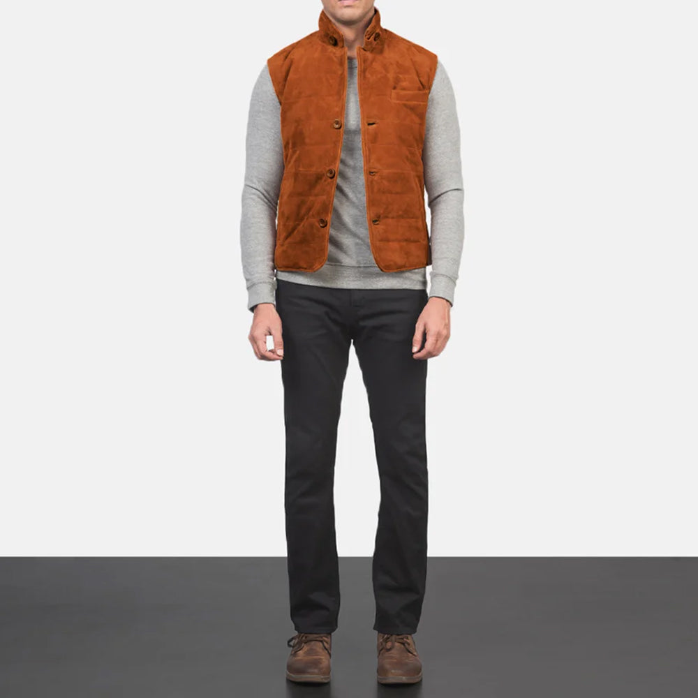 Man wearing a suede leather vest paired with jeans, showing a classic Western-style outfit with a buttoned front.