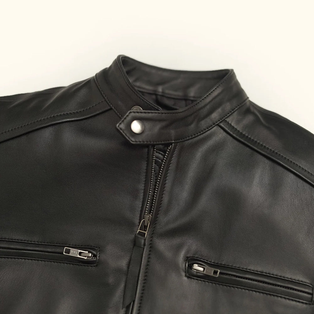 Detailed image of the sturdy zipper and collar on the leather jacket.