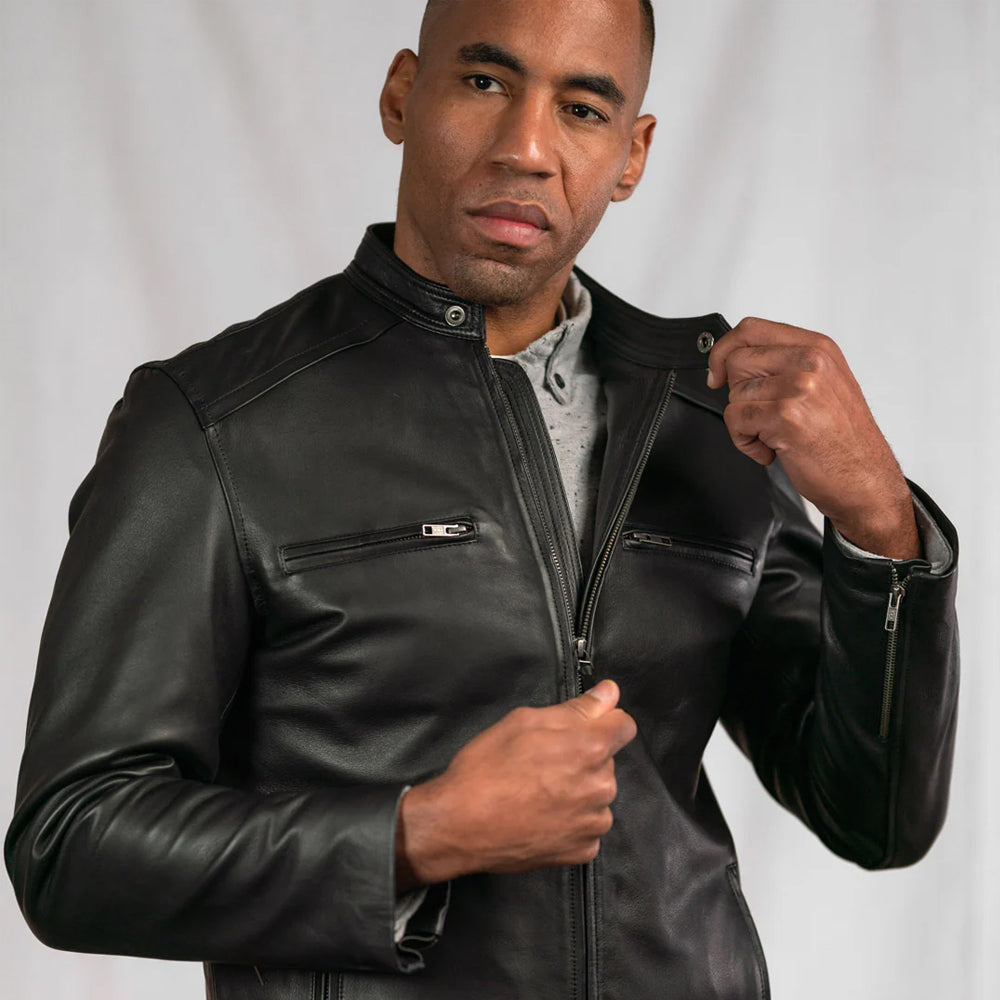 Leather bomber jacket with classic design and quilted pattern.