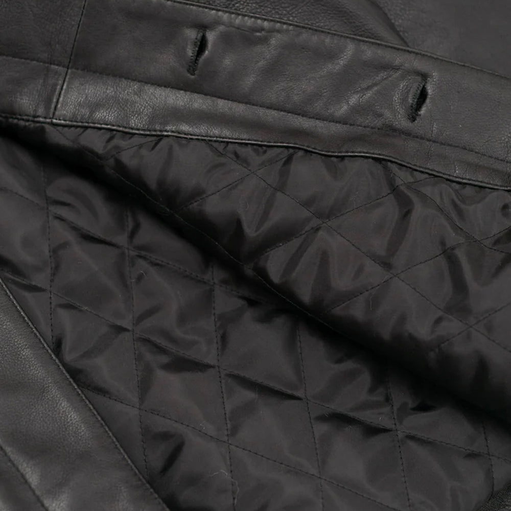Men’s Black Lambskin Leather Trucker Jacket neatly folded showing premium quality leather and lining.