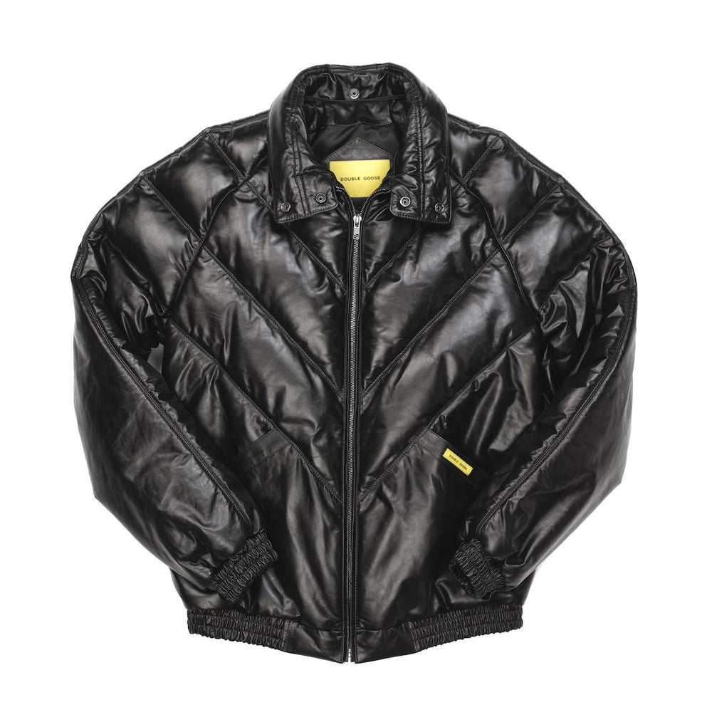 Close-up of stand-up collar base, metallic snap fasteners, and heavy-duty zipper track on black lambskin jacket.