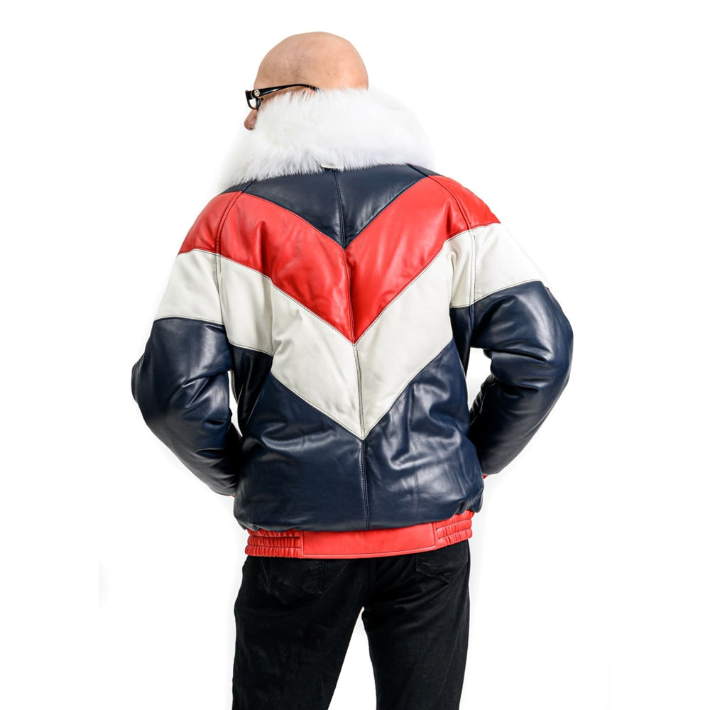 Back view of men's Goose Country tri-color V-Bomber leather jacket showing navy, red and white chevron panels with white fox fur collar