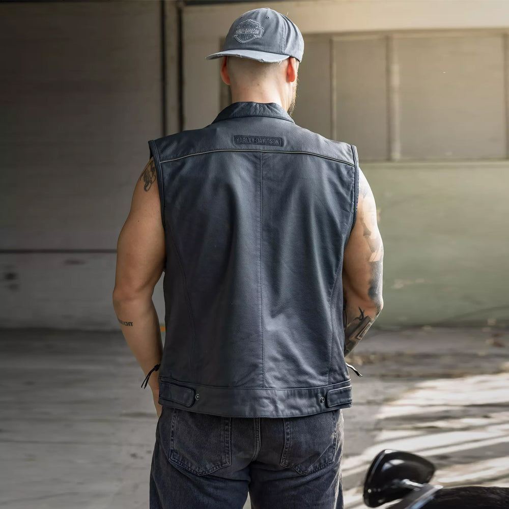 Rear view of model wearing the Harley-Davidson Foster leather vest.