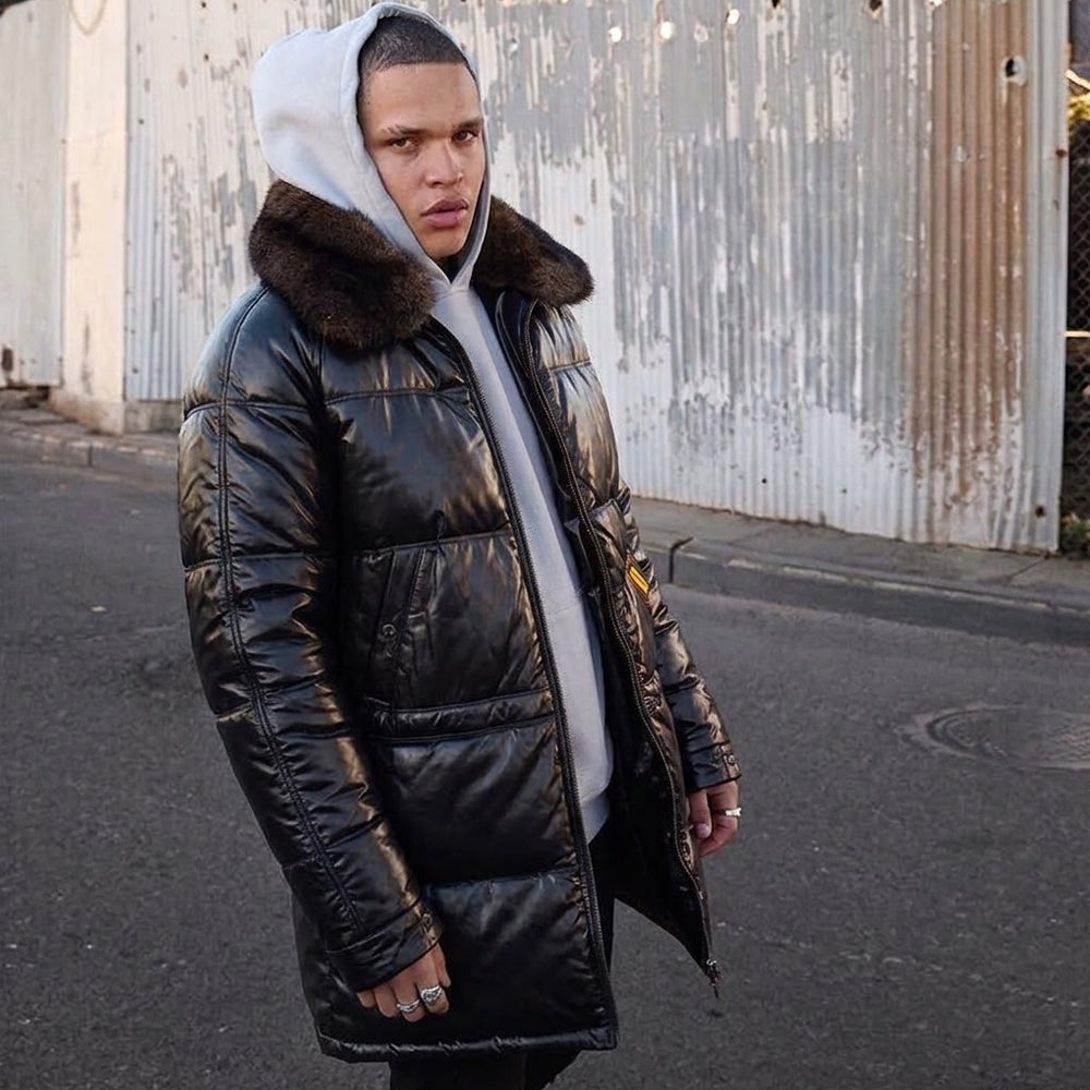 Man wearing Double Goose black leather down parka with detachable fur collar and hood, street style