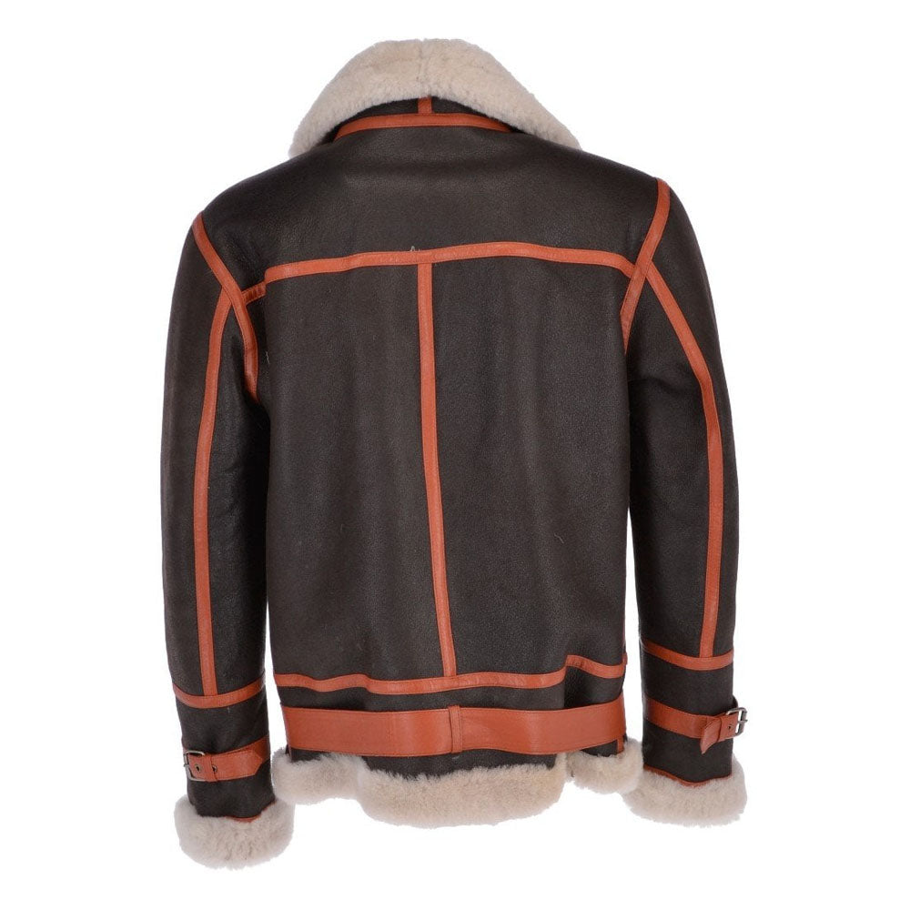 Back view of men's dark nubuck shearling bomber coat showing light brown seam piping across back yoke and vertical center line