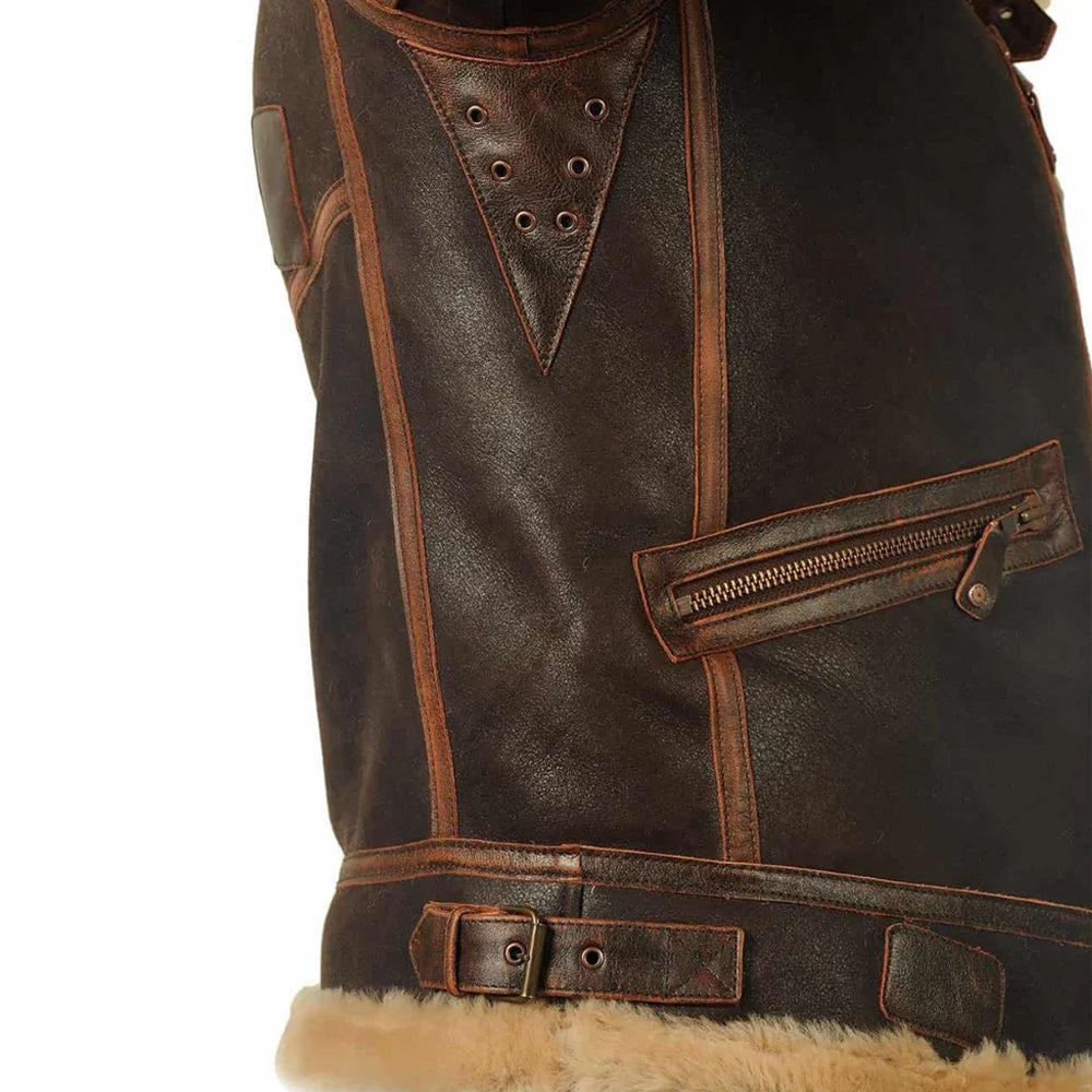 Close-up of 6-eyelet brass underarm grommet gusset for breathability on distressed leather flight coat