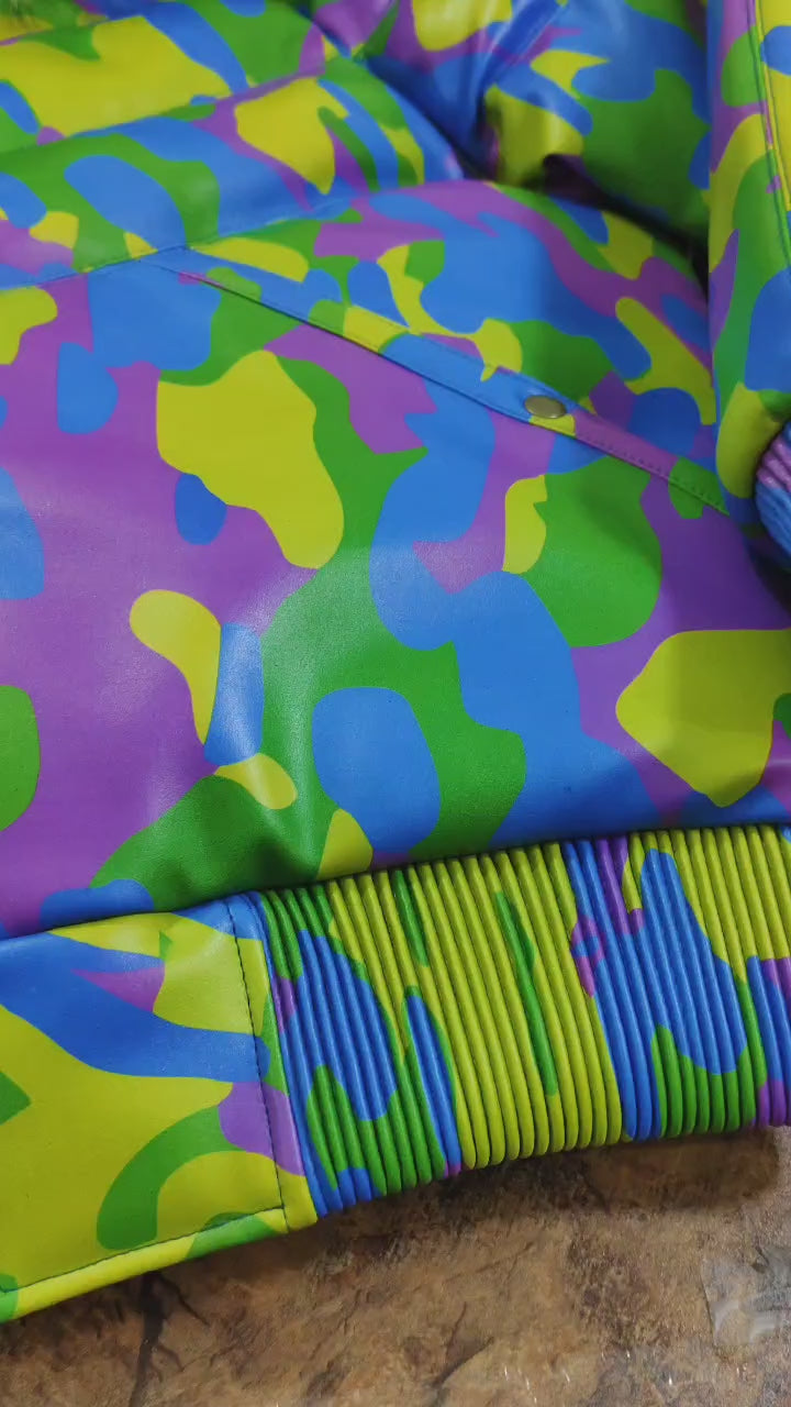 Men's Camo Sheepskin Leather V-Bomber Jacket in action – real leather, 100% duck down, removable fur hood, YKK zip, and stylish winter fashion.