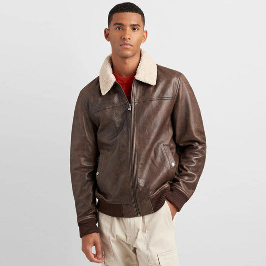 Model wearing a leather bomber jacket, styled for a smart casual office look.