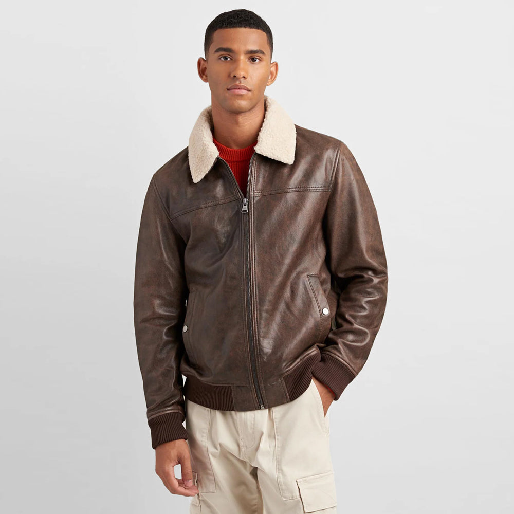 Stylish leather bomber jacket displayed with a modern outfit, showcasing timeless fashion, versatility, and expert styling tips for men and women.