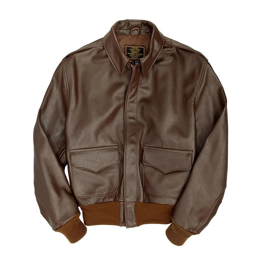Front flat lay view of 1931 spec USAAF A-2 russet horsehide flight jacket showing scalloped pockets and ribbed hem.