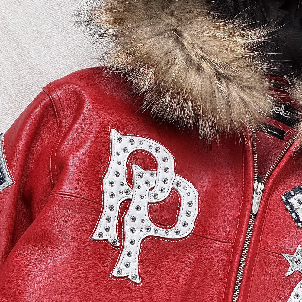 Close-up of Pelle Pelle embroidered patch with rhinestones on the front of the American Bruiser jacket.