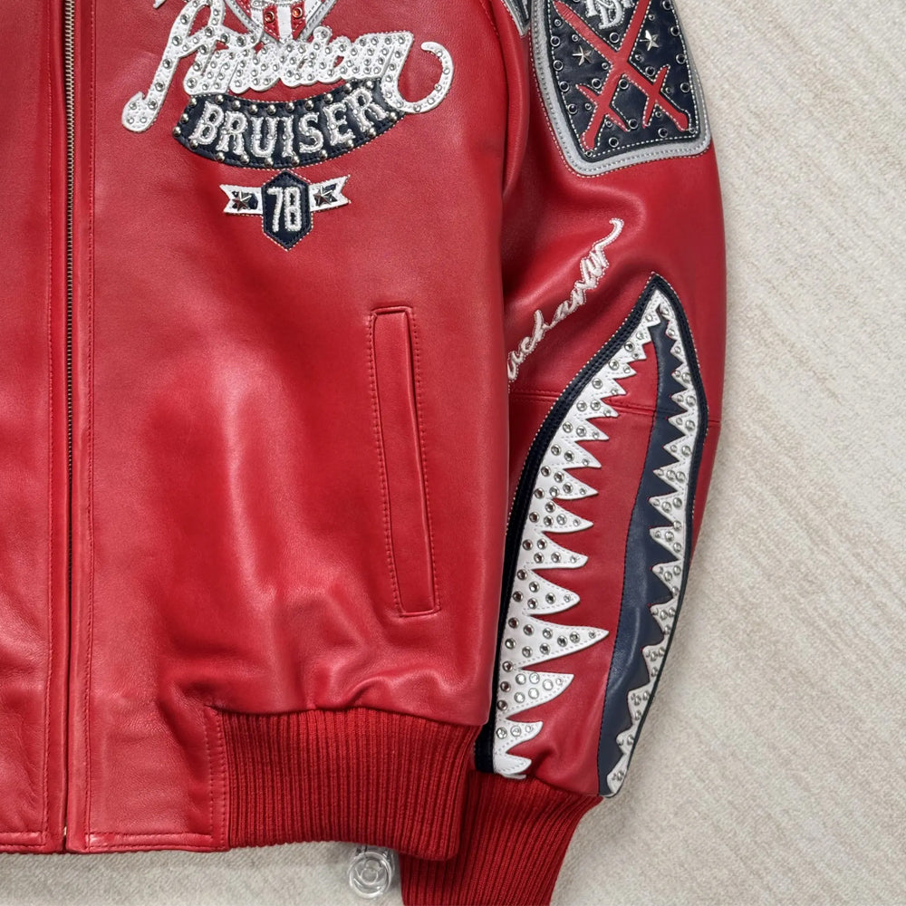 Front pocket close-up of Pelle Pelle American Bruiser red leather jacket with detailed stitching.