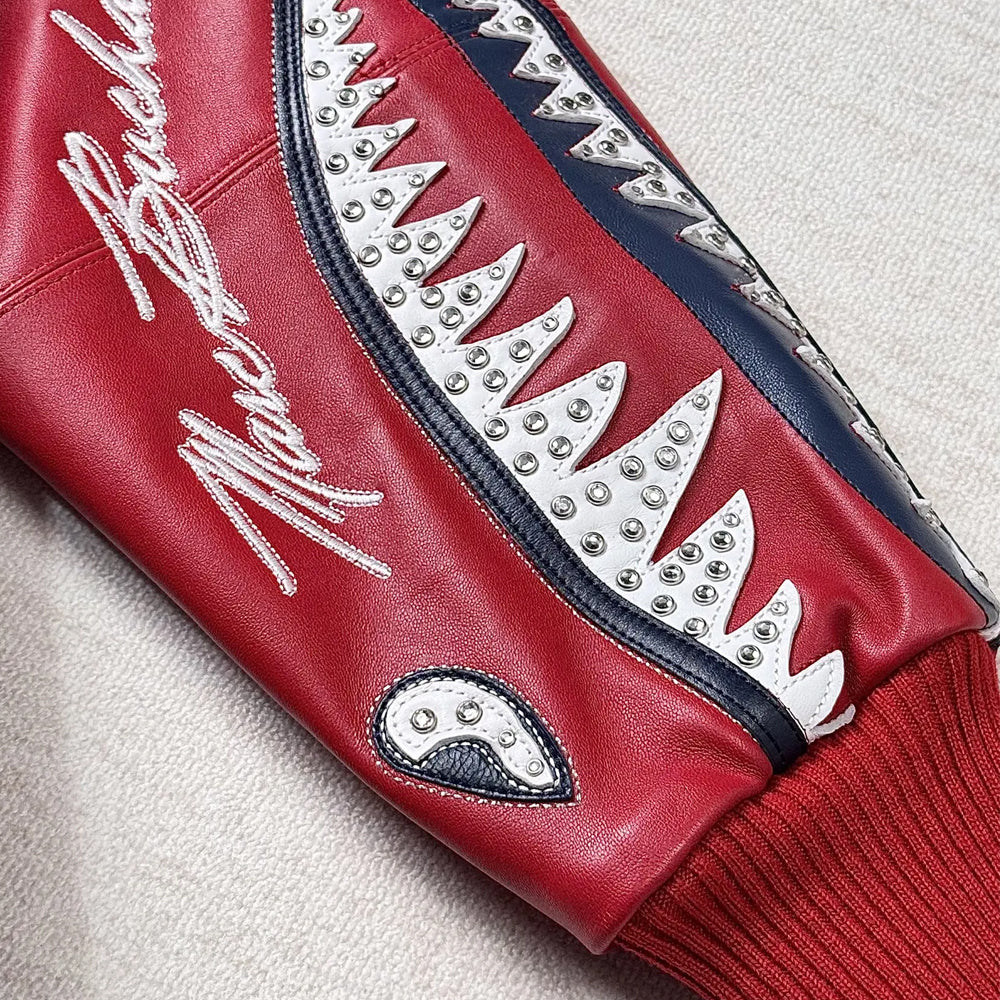 Sleeve patch close-up of Pelle Pelle American Bruiser jacket with layered leather and crystal design.