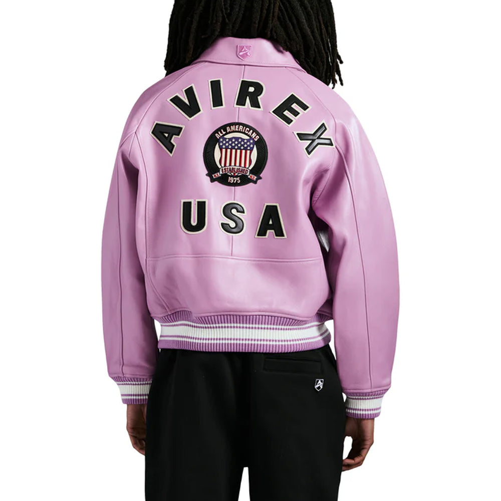 Person wearing a pink Avirex jacket with branding on the back