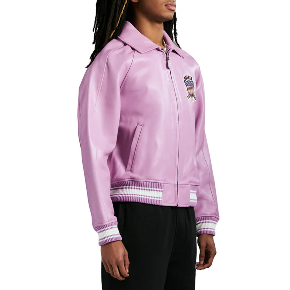 Person wearing a pink jacket with a logo on a white background