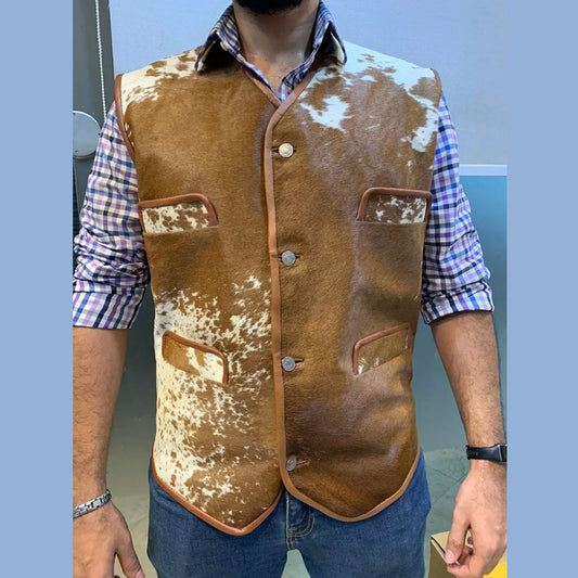 Men’s cowhide leather vest with a brown and white fur pattern, Western-style waistcoat with snap button closure and functional pockets.