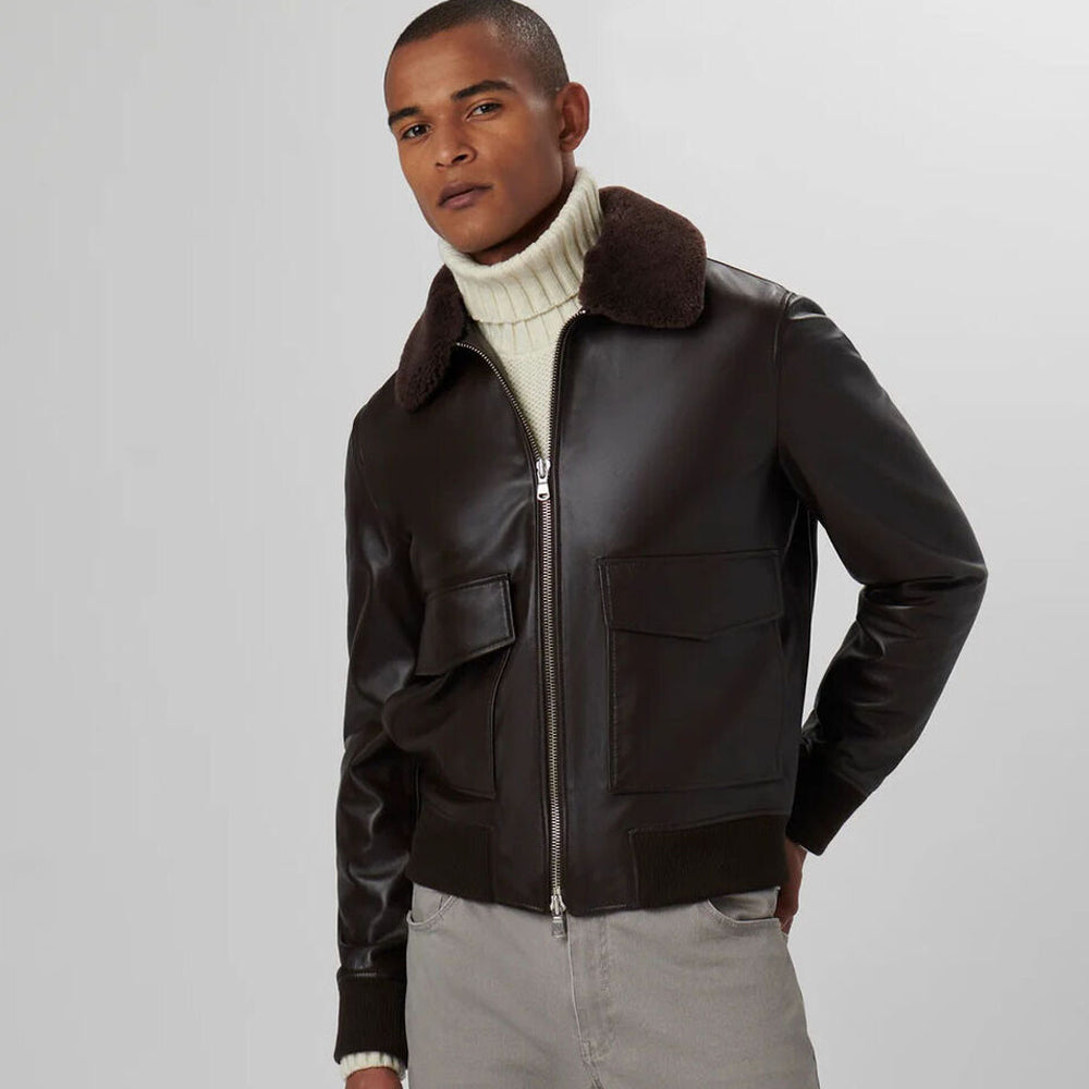 Man in stylish side pose wearing Men’s RAF Aviator Shearling G1 Bomber Jacket.