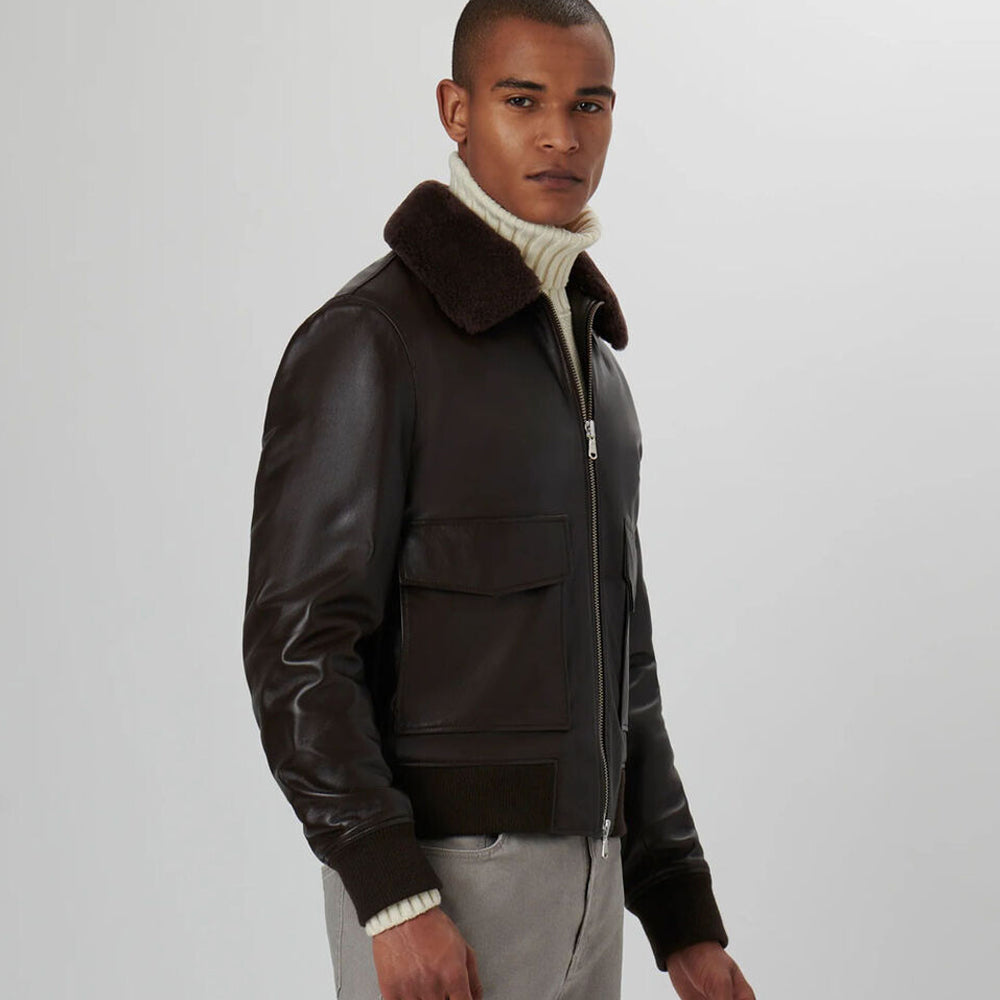 Man in side pose showcasing Men’s RAF Aviator Shearling G1 Bomber Jacket.