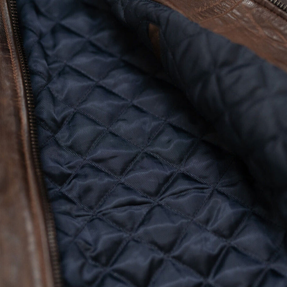 Close-up of polyester lining inside Men’s Vintage A2 Bomber Leather Jacket, showcasing comfort and warmth.