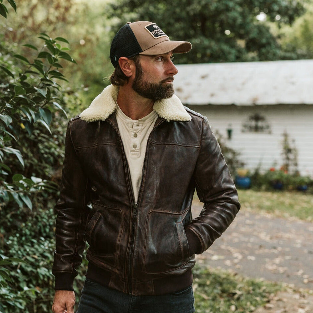 Full-length view of model wearing vintage A2 bomber jacket on street