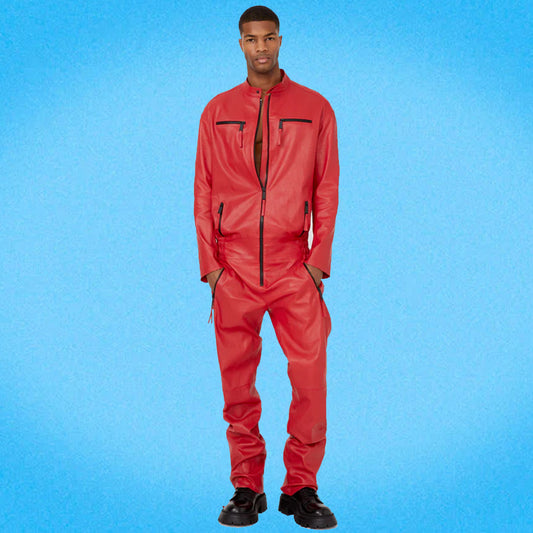 Man wearing a bold red leather jumpsuit with a front zipper, biker-style snap collar, and contrast zipper details. Stylish and modern design.