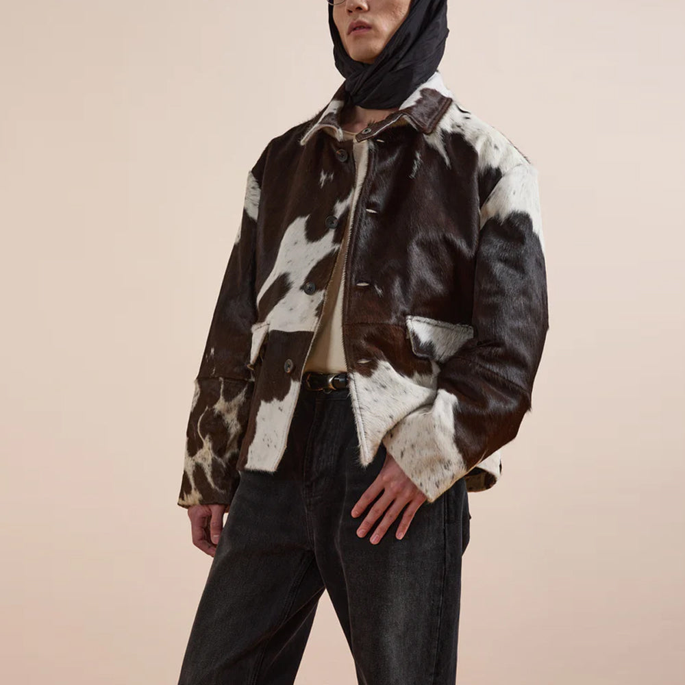 Bold cow pattern leather jacket with structured fit and front patch pockets