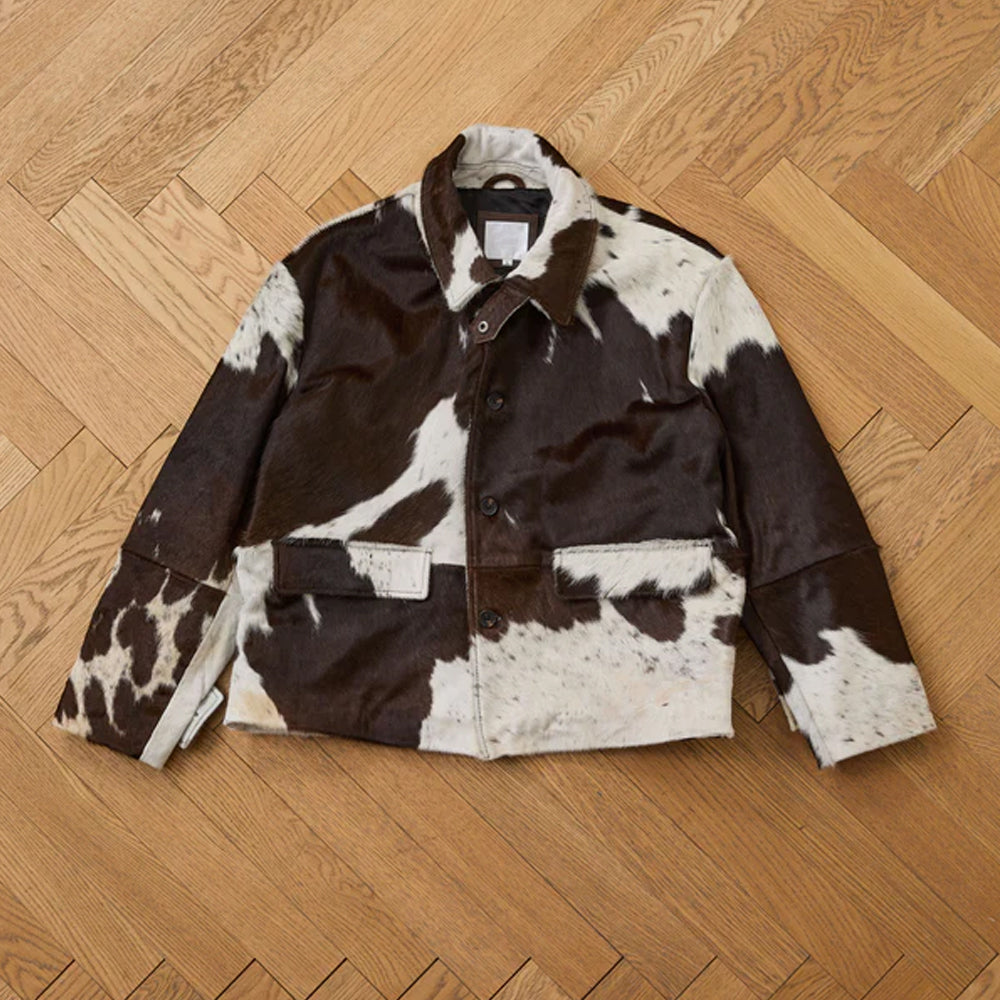 Handmade cowhide leather jacket in natural brown and white with button closure