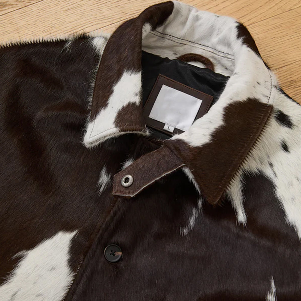 Natural cowhide jacket featuring brown and white spots with traditional workwear styling