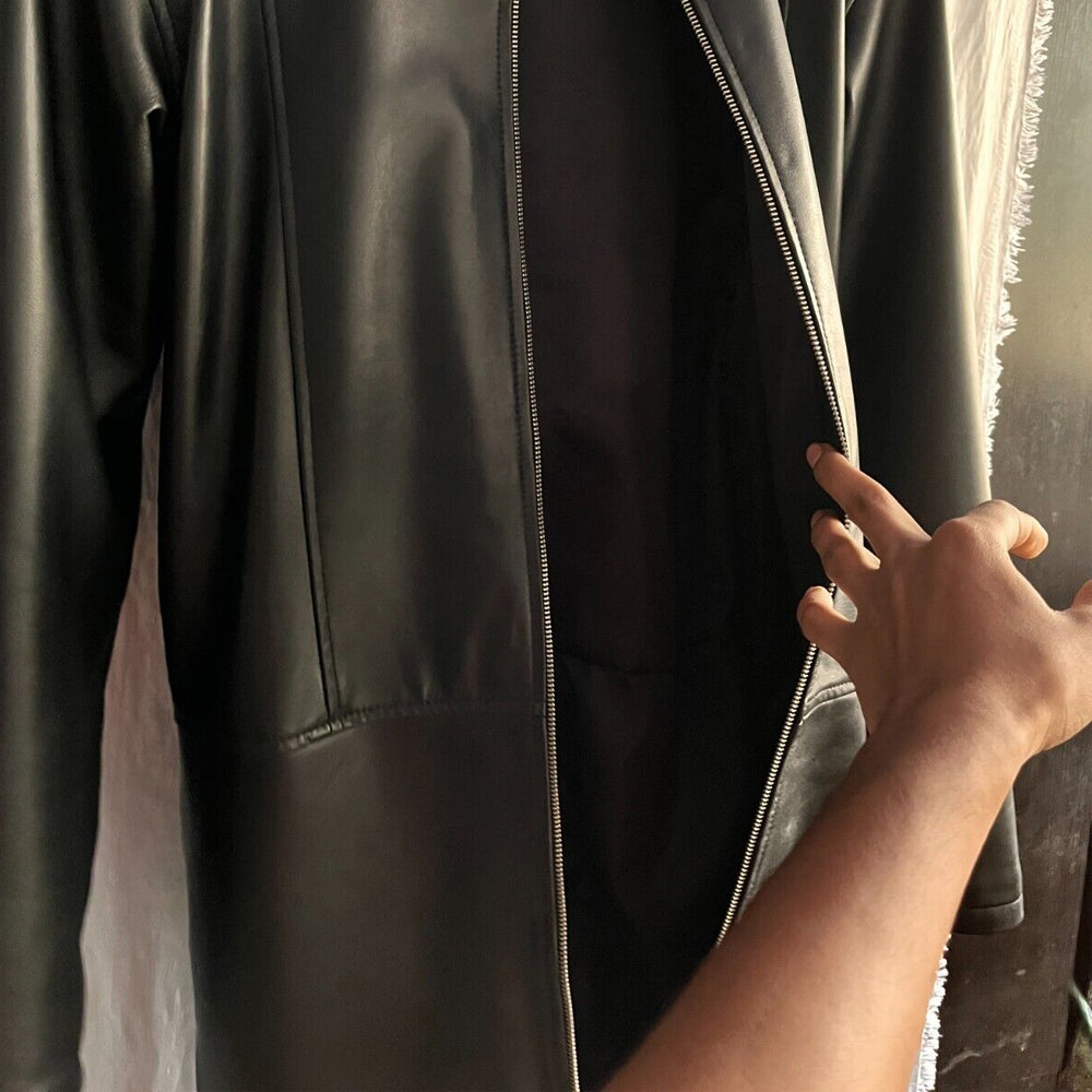 Close-up of Men’s Black Leather Bodysuit interior, showing soft sheepskin leather lining for comfort.