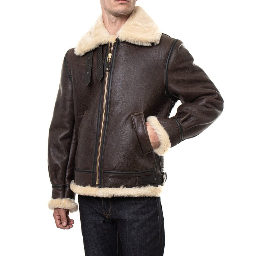 Model wearing men’s vintage brown B3 RAF aviator sheepskin shearling bomber jacket with front closure zip closed
