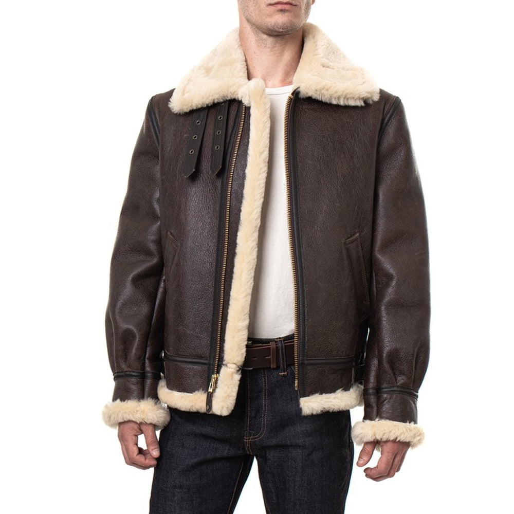 Model wearing men’s B3 RAF aviator shearling bomber jacket in vintage brown with open front zipper