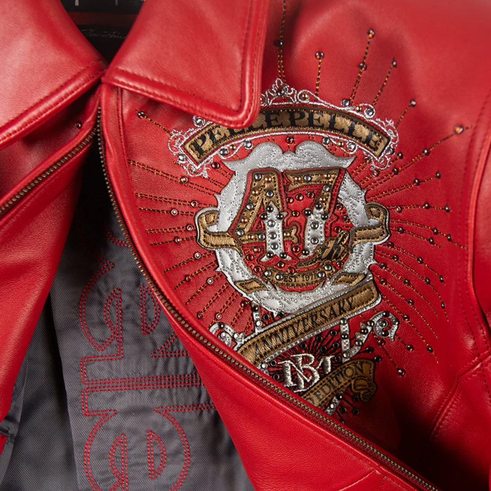 Pelle Pelle double P chest patch close up with rhinestones and metallic embroidery