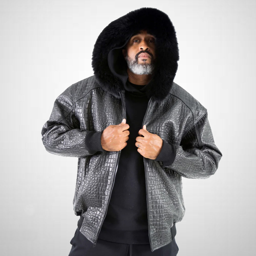 Man wearing the jacket with the hood on and the front zip open, emphasizing the luxurious interior satin lining.