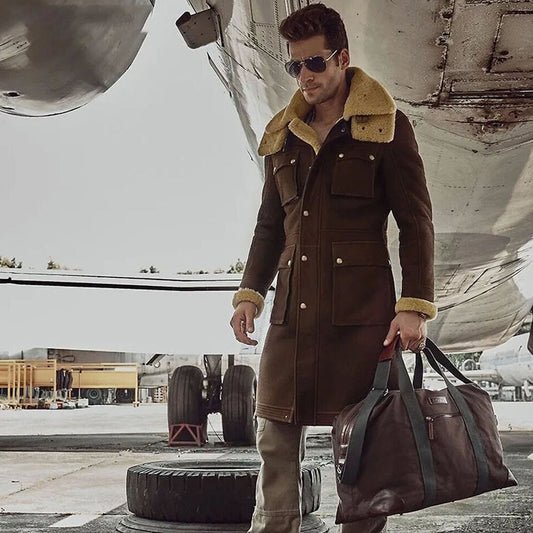 Man wearing tobacco nubuck leather trench coat with shearling collar and cargo pockets