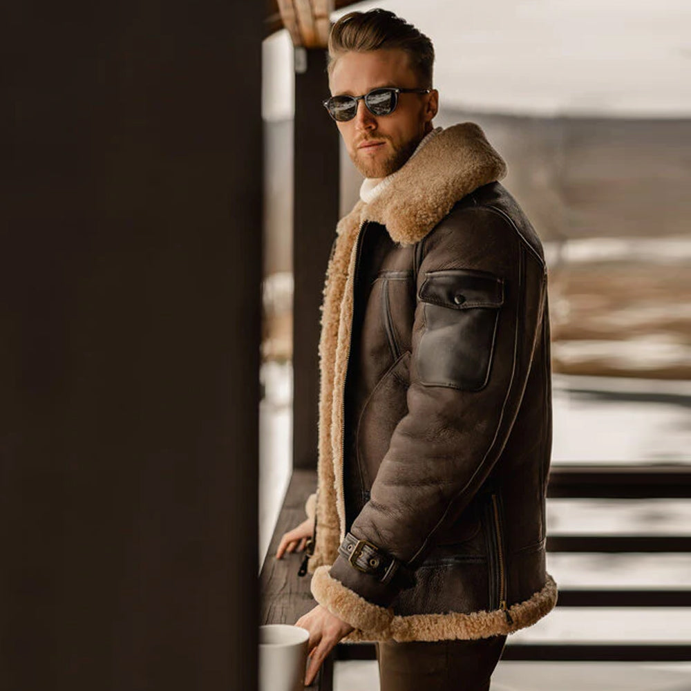 Man wearing B3 Aviator Shearling Bomber Jacket in a side pose, highlighting the sleeve pocket and premium leather texture.