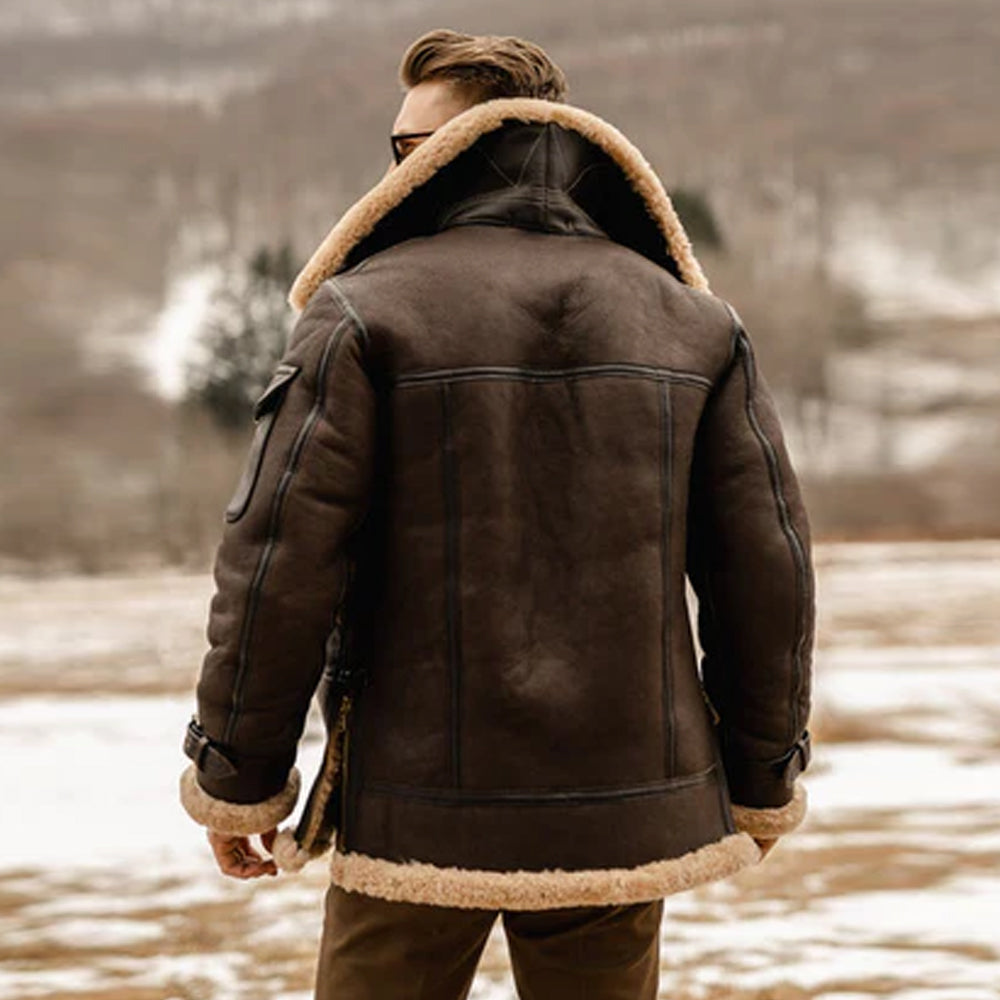 Backside pose of the man wearing the B3 Aviator Jacket with a stand-up collar, showcasing the jacket's long silhouette and fine detailing.