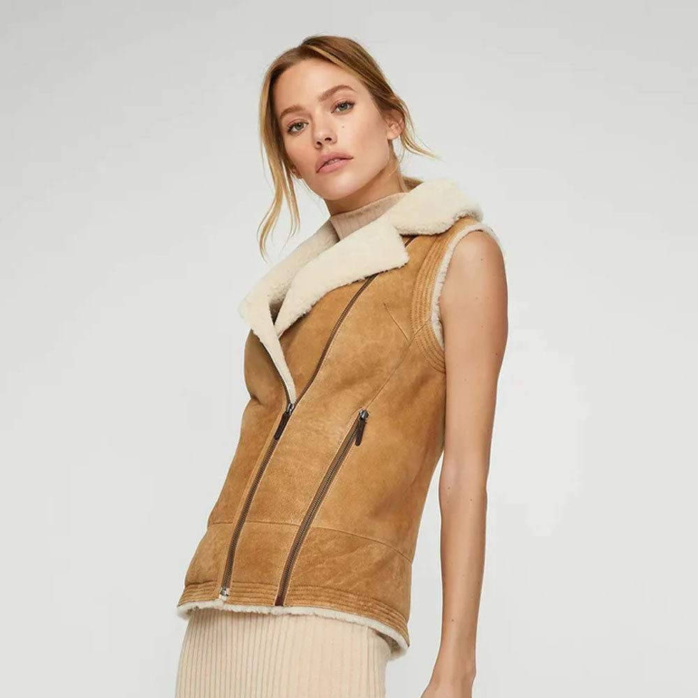 Side view of model wearing women's shearling vest, showing stylish silhouette and fit.