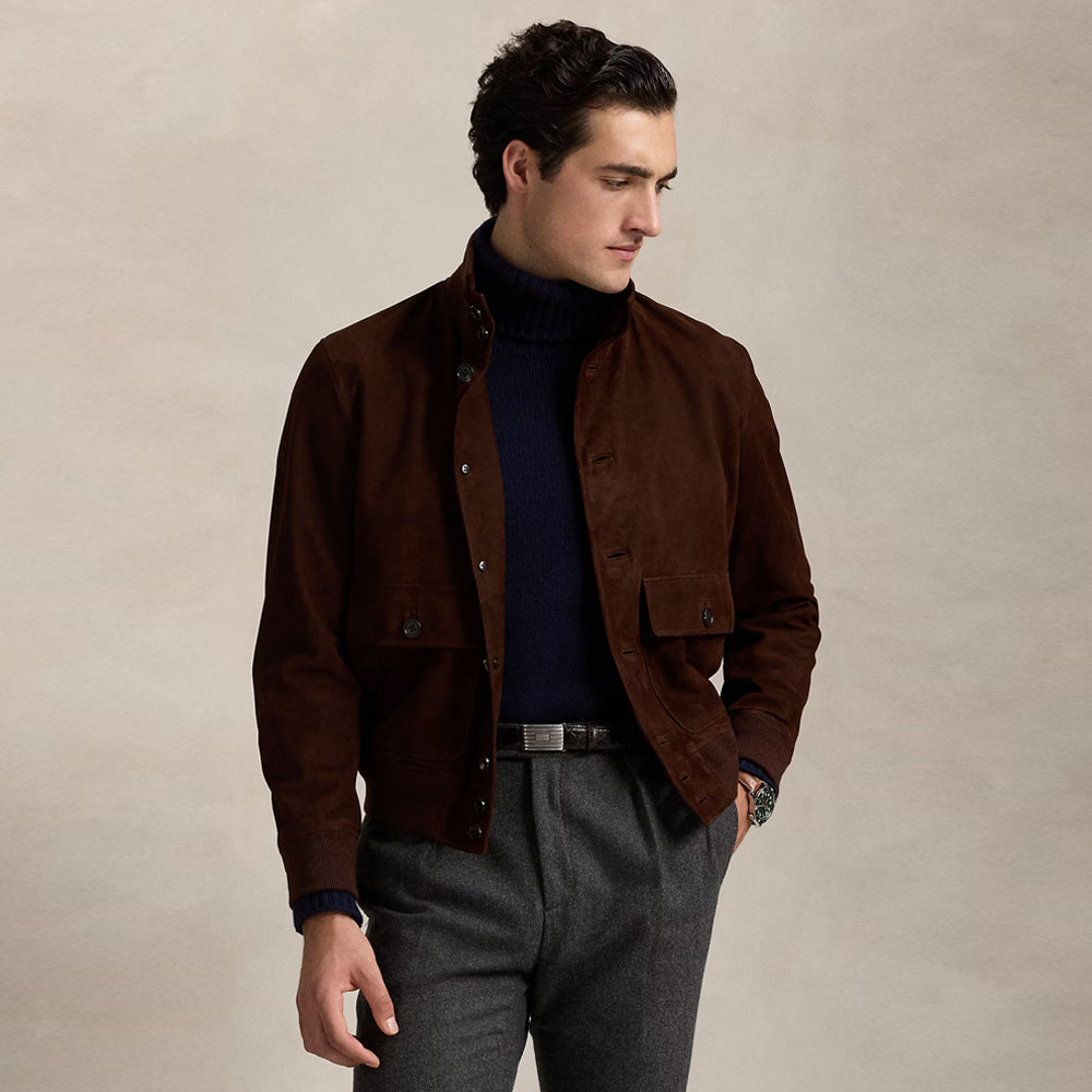 Model wearing a men's brown suede leather jacket with open front buttons, showcasing a soft goatskin texture.