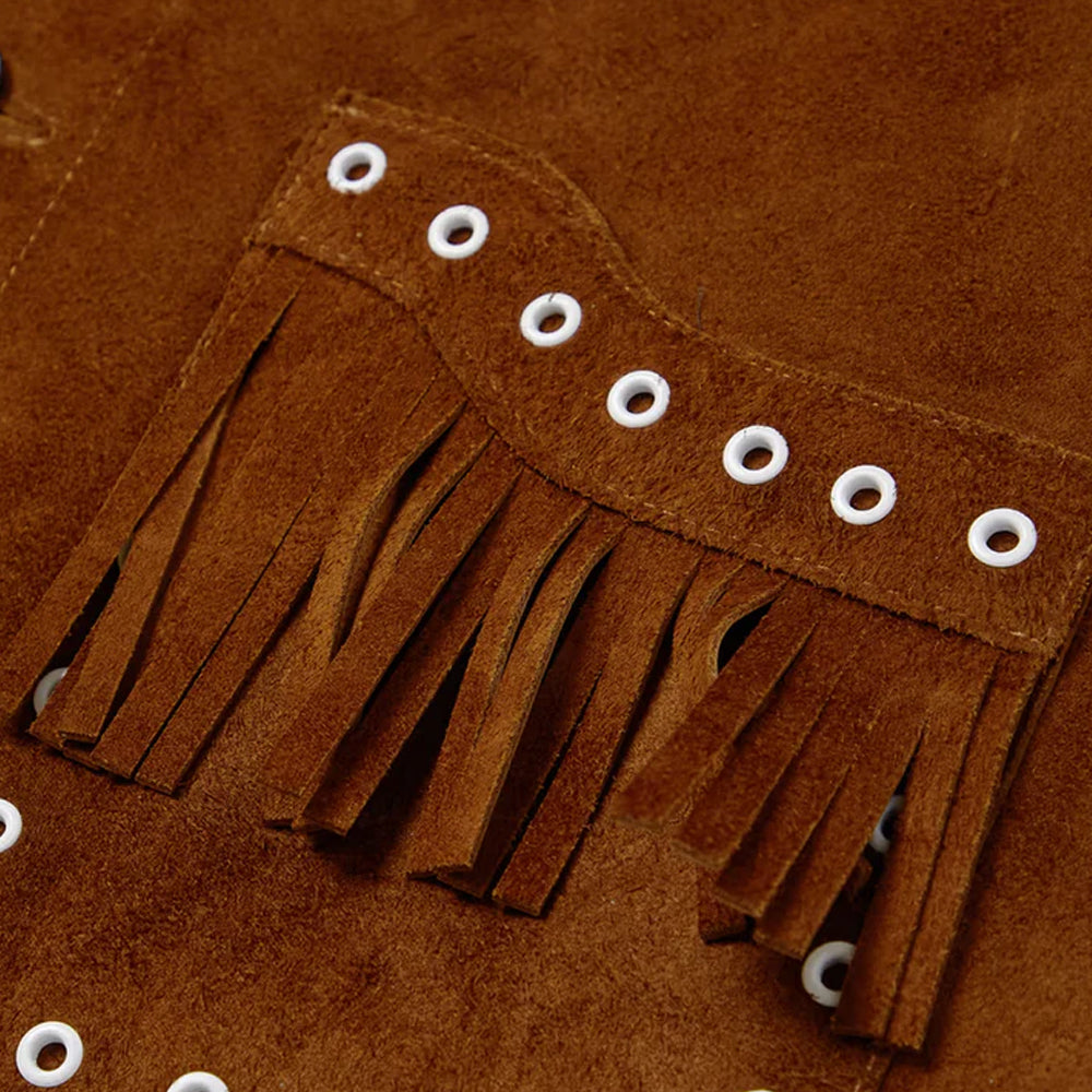 Close-up of the pocket with fringe detailing on the genuine brown suede leather jacket.