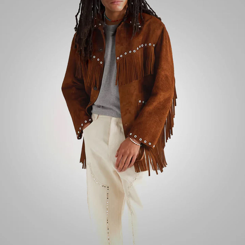 Man wearing the brown suede leather jacket with fringe, front closure open, and hand in pants pocket for a relaxed look.