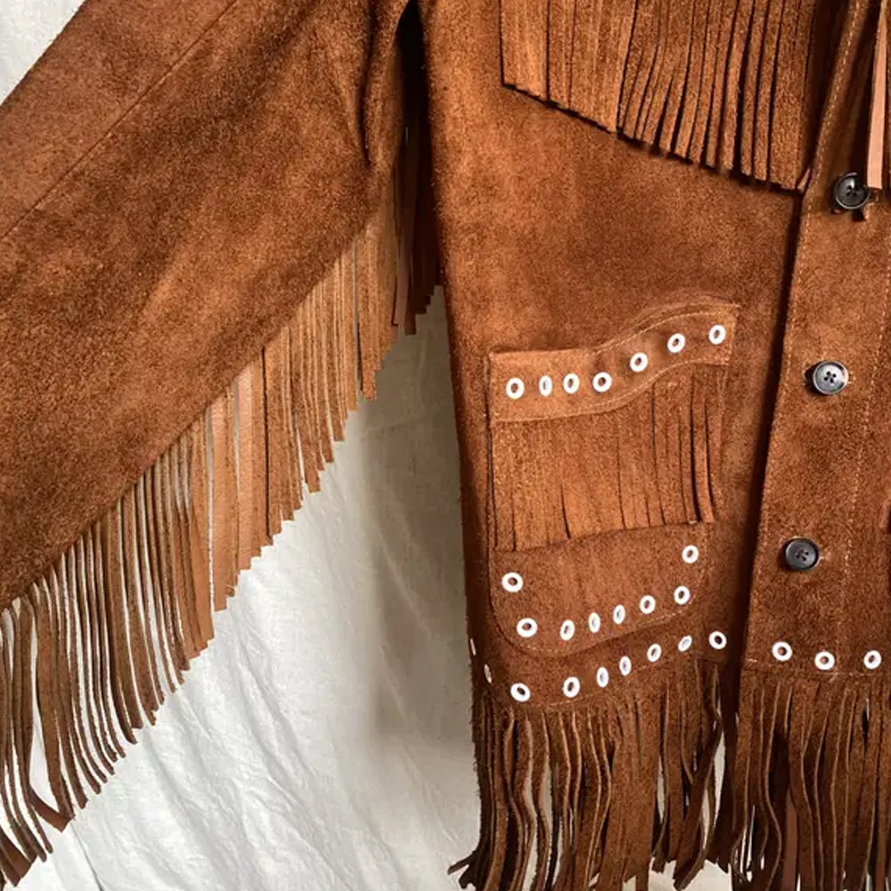 Close-up of the side pocket and arm fringe on the brown suede leather jacket, adding a unique Western flair.